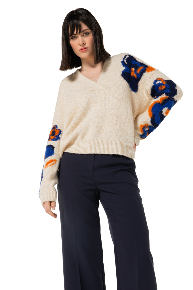 Winterse pull met bloemdetail